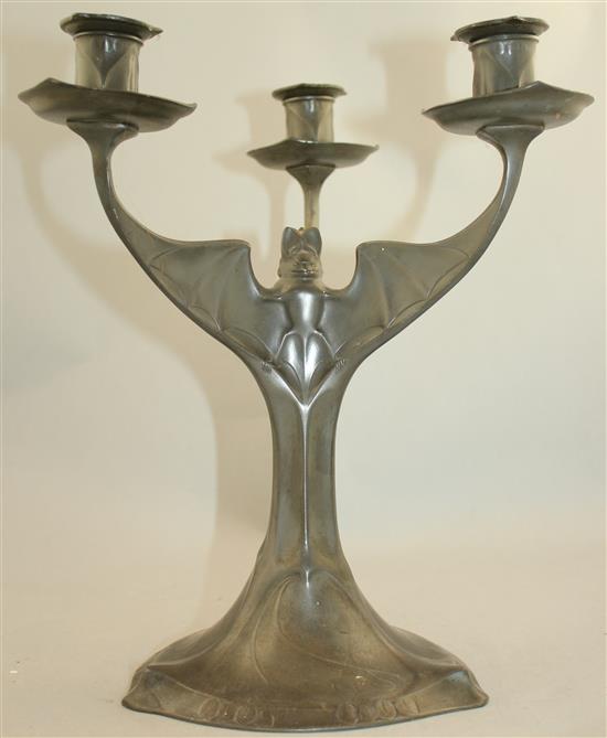 Hugo Levin. A Kayserzinn pewter three branch bat candelabrum, 12.5in.